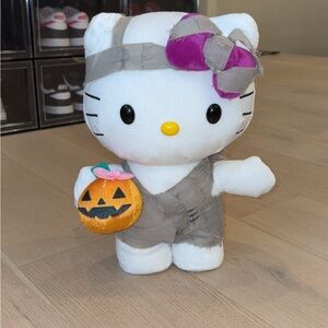 Sanrio White Kitty side stepper with Gray Outfit and Purple Bow